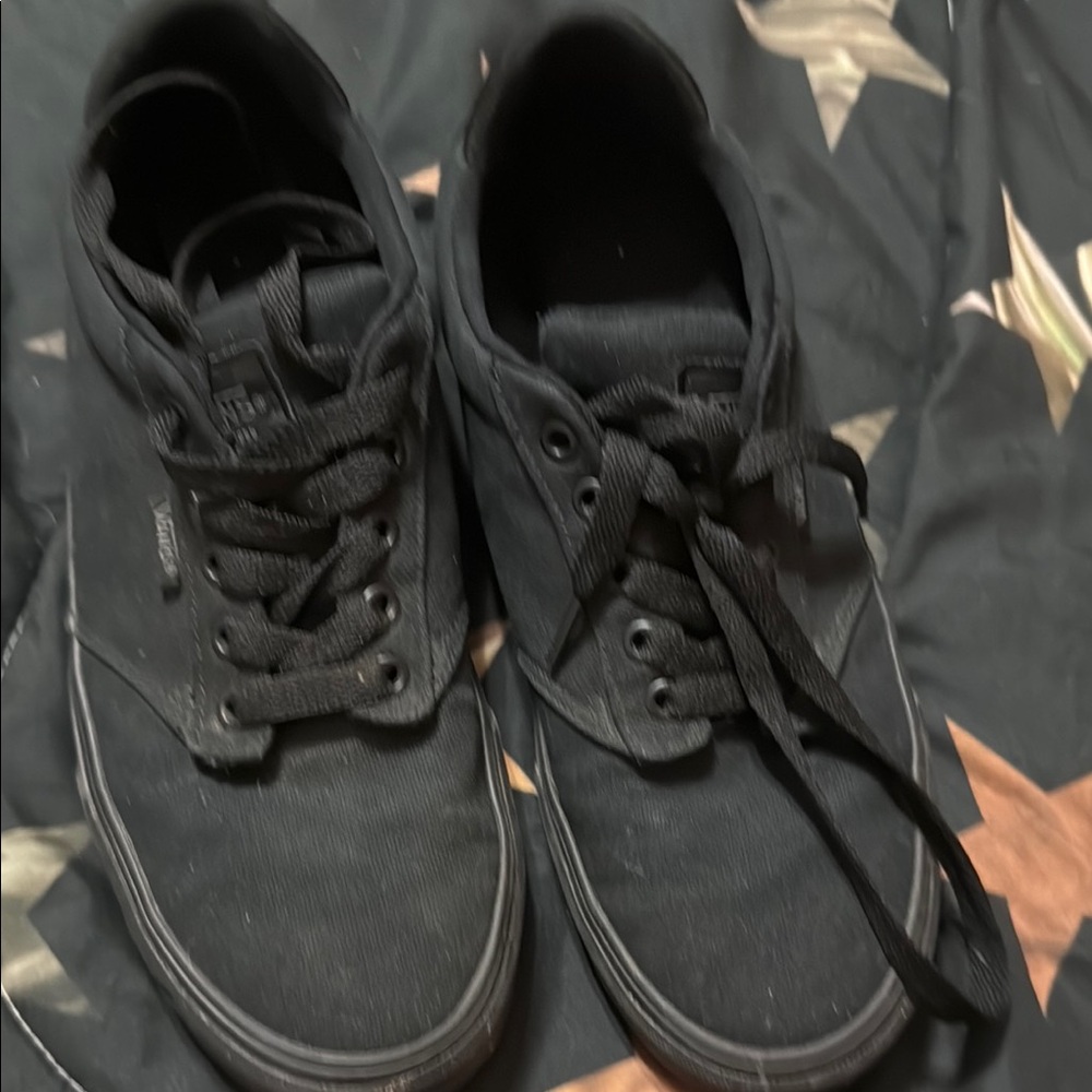 Vans Black Sneakers my son wore a couple times and grew out of them men’s size 9